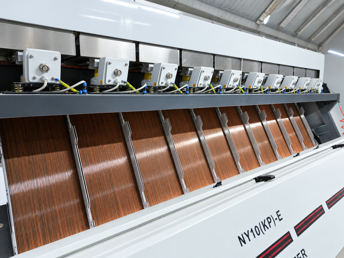 Optical colour sorter channels at the mill